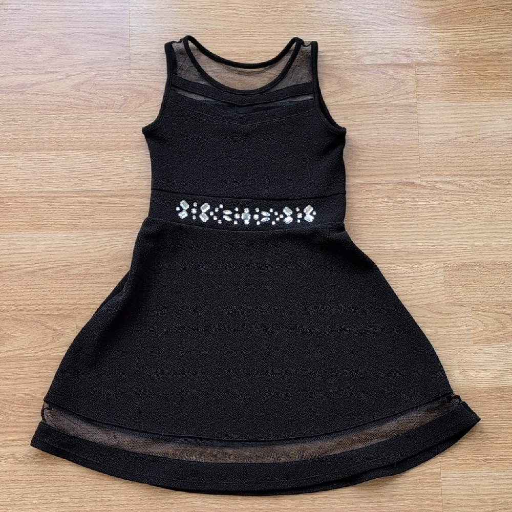 Place Elegant Black Dress with White Embellishments